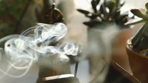Incense stick smoke in slow motion close up Stock Footage 143177357