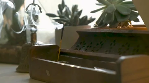 Incense stick smoke in slow motion close up 動画素材 143177642