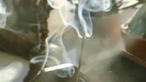 Incense stick smoke in slow motion close up Stock Footage 143177776