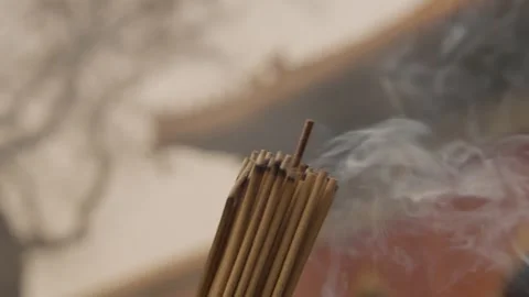 Incense Sticks Burning with Smoke in Front of Temple at Lama Temple, Beijing Stock Footage 345686438