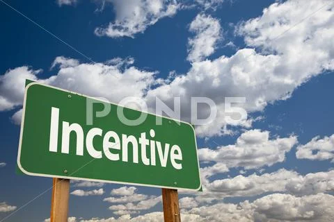 Incentive Green Road Sign Over Clouds and Sky. Stock Photos