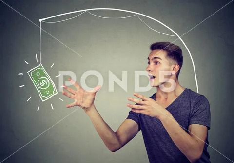 Incentive trap business concept. Man running towards a dollar symbol trying t Stock Photos