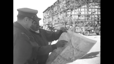 INCHEON - 1950 - General Douglas MacArthur looks at a map with General Edward Stock Footage 259291024