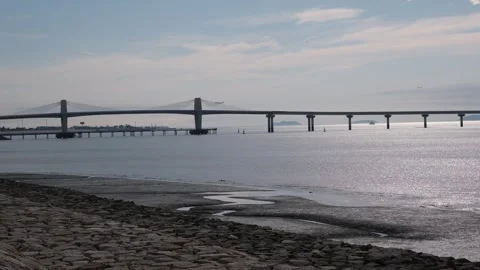 Incheon Bridge, the longest cable-stayed bridge in South Korea, at sunset 動画素材 346710147
