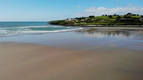 Inchydoney beach Cork Ireland forward moving aerial shot Stock Footage