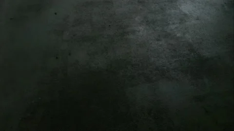 Incident light from a window moves across a concrete surface. time-lapse. Stock Footage 239239216