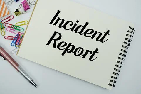 Incident Report text message written on notepad with stationery flat lay on.. Stock Photos