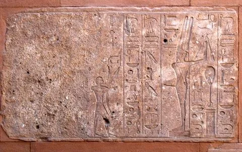 Incised blocks making up part of the reconstructed red chapel or Chapelle Rou Foto stock