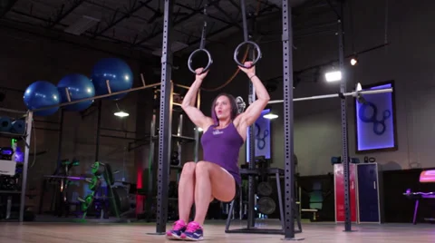 Incline pull ups on olympic rings Stock Footage 30367091