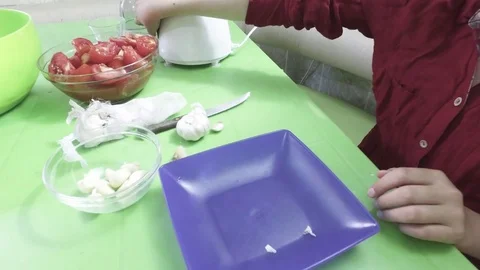 Includes a blender. Cleans the garlic Stock-Footage 79631870