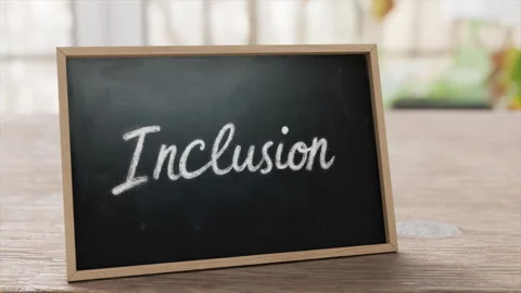 Inclusion Message Displayed on Chalkboard in Bright, Open Room, Natural Light Stock Footage 316683474