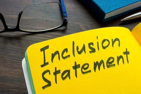 Inclusion statement on notebook highlighting diversity policy. Stock Photos