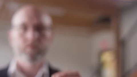 "Inclusion" written on clear plexiglass with a marker by a modern businessman Stock-Footage 133274028