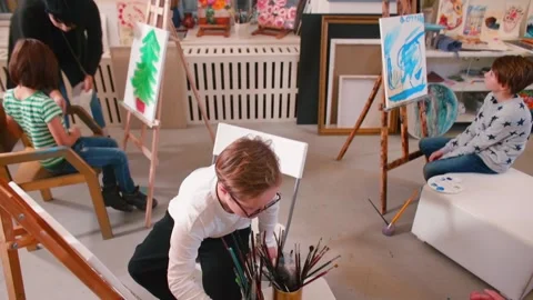 Inclusive art programs. Helping kids make friends with people who are different. Stock Footage 144546035