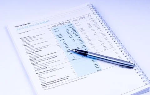 Income statement with pen Stock Photos