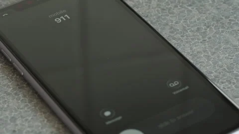 Incoming call from 911 on smartphone macro video. Video stock 340545788