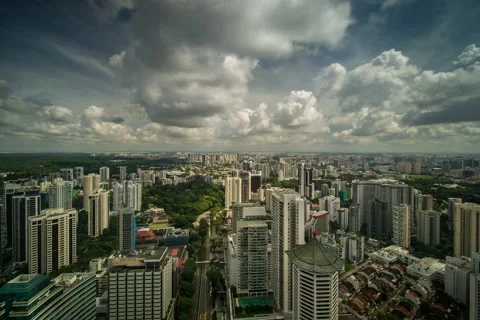 Incoming fast clouds timelapse buildings singapore high angle day Stock Footage 150802811
