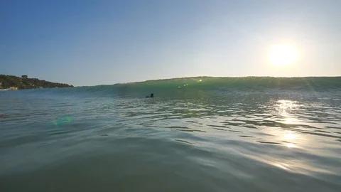 Incoming ocean wave in slowmotion front view, shot from water level Video stock 90004864