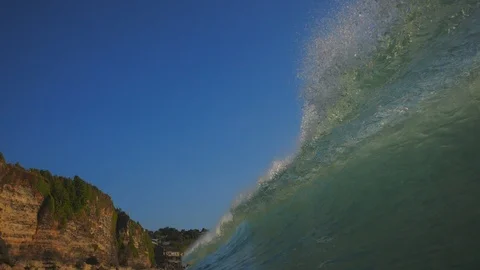 Incoming ocean wave at sunset time shot from water 스톡 동영상 90004786