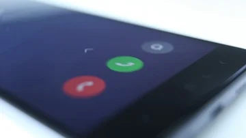 Incoming phone call indication on smartphone display close-up, Answering an Stock Footage