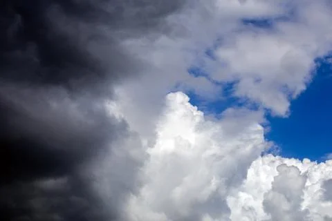 Incoming storm close-up cloudscape at march daylight in continental europe Stock Photos