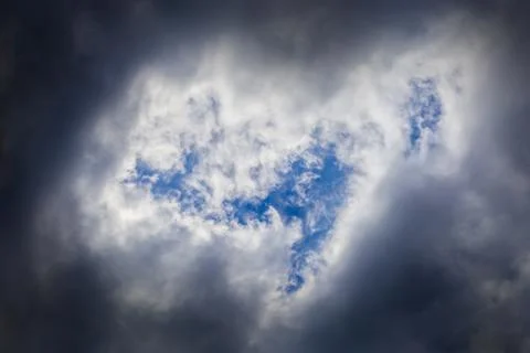Incoming storm close-up cloudscape at march daylight in continental europe Stock Photos