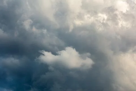Incoming storm close-up cloudscape at march daylight in continental europe Фото