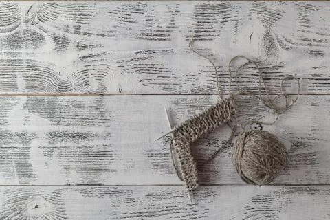 Incomplete knitting project with needles Foto stock