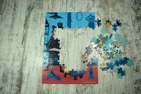 Incompletely assembled puzzle Stock Photos