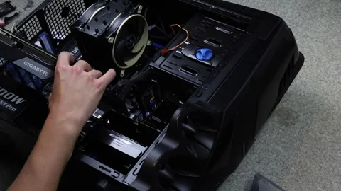Incorrectly installing graphics card into PC computer case Stock Footage 321499518