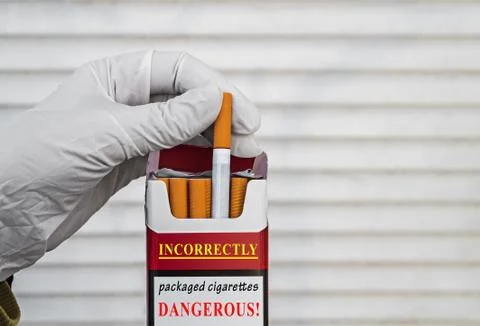Incorrectly packaged cigarettes Stock Photos