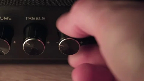 Increase the bass in the speakers, the man increases the bass Stock Footage 264327334