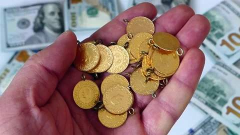 The increase in gold prices in 2023, the decline of the dollar, the increas.. Stock Footage 237255409
