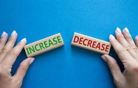 Increase or Decrease symbol. Concept word Increase or Decrease on wooden bl.. 스톡 사진