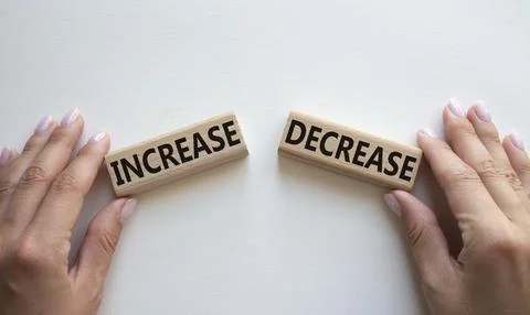 Increase or Decrease symbol. Concept word Increase or Decrease on wooden bl.. 스톡 사진