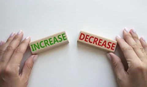 Increase or Decrease symbol. Concept word Increase or Decrease on wooden bl.. 스톡 사진