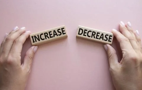 Increase or Decrease symbol. Concept word Increase or Decrease on wooden bl.. 스톡 사진