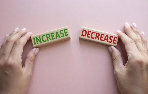 Increase or Decrease symbol. Concept word Increase or Decrease on wooden bl.. 스톡 사진