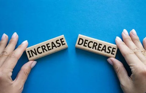 Increase or Decrease symbol. Concept word Increase or Decrease on wooden bl.. 스톡 사진