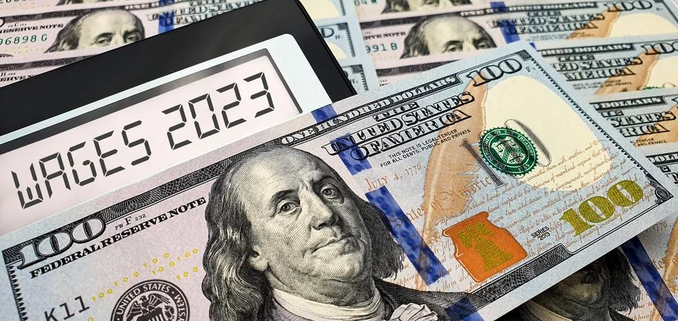 Increase or decrease in wages in 2023 스톡 사진