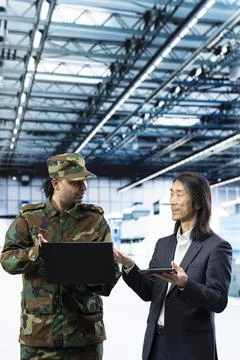 Increase semiconductor self sufficiency, laptop and army man with senior manager Stock Photos