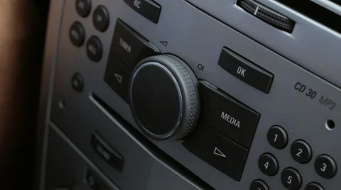 Increase the volume of music in the car. Stock Footage 54335972