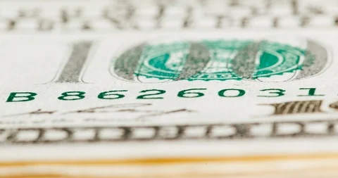 Increasing and decreasing bundle of banknotes with focus on continuously Stock Footage 120827390