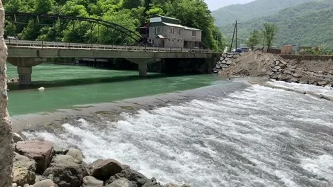 The increasing flow of water under the bridge Stock Footage 150664660
