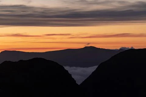 Incredible cloud inversion landscape view of the Rhinogydd in Snowdonia UK Stock Photos
