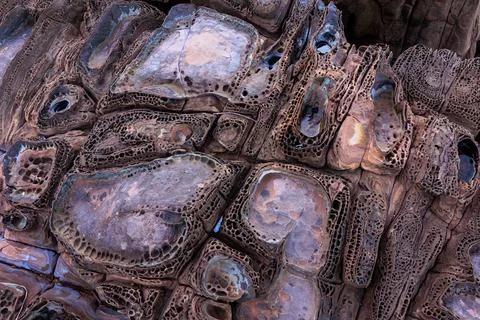 Incredible erosion patterns on rocks along the shore, Thailand Stockfoto's