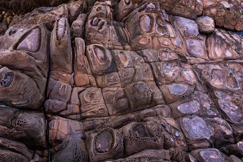 Incredible erosion patterns on rocks along the shore, Thailand Stockfoto's