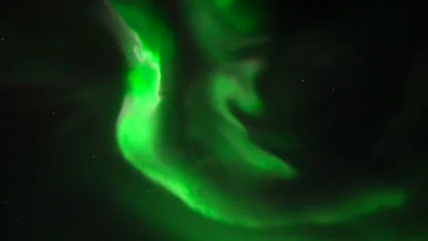Incredible green dancing light of aurora borealis in Tromso starry night sky Video stock 334052039