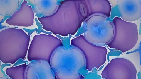 Incredible ink-in-liquid effect. Magenta and Cyan. Fascinating movement Stock Footage 165025993
