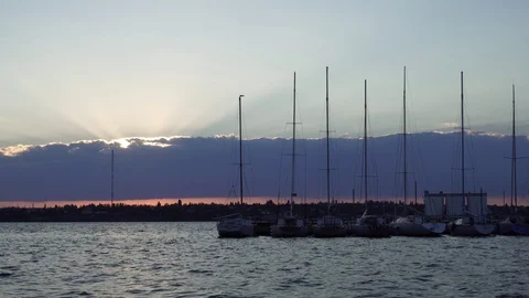 Incredible low angle shot of modern boats yachts silhouette in calm river harbor Stock-Footage 94031935